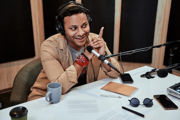 A person wearing headphones and enthusiastically recording a podcast in a professional-looking studio. Various microphones and soundproofing panels are visible, indicating a high-quality recording environment.