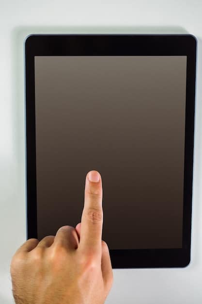 A detailed, close-up shot of a human hand pointing at a tablet screen displaying complex bar charts and line graphs, with subtle numerical data, symbolizing the process of analyzing podcast analytics for strategic decision-making.