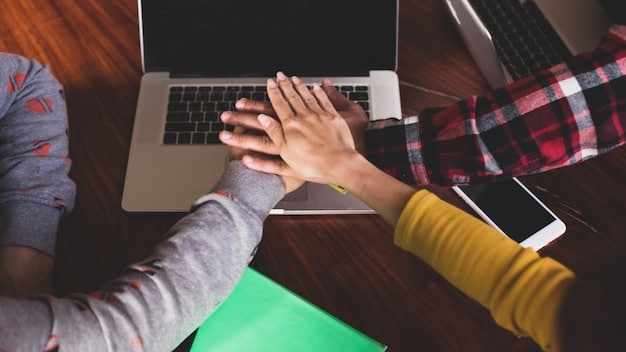 A close-up shot of hands shaking over a table with a laptop displaying podcast analytics, symbolizing a successful partnership agreement. The atmosphere is collaborative and professional.